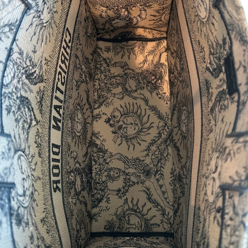 Christian Dior Book Tote
Brown Large Tote 
Brown and Black Canvas
Rolled Handles & Dual Shoulder Straps
Embroidered Accent
Open Top