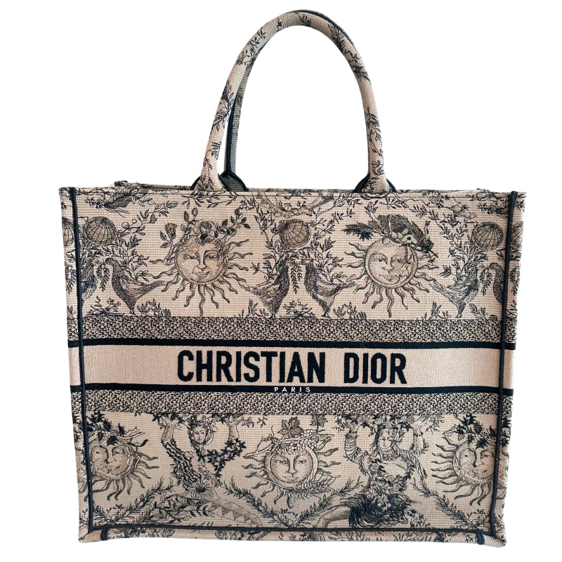 Christian Dior Book Tote
Brown Large Tote 
Brown and Black Canvas
Rolled Handles & Dual Shoulder Straps
Embroidered Accent
Open Top