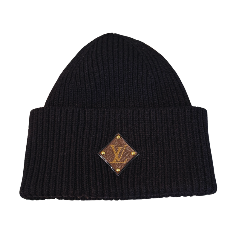 Black Louis Vuitton Initiales Monogram Wool Beanie on a white background.