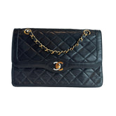 Chanel Multi-Tone Flap Bag 
Multicolor Hardware
Single Interior Pocket 
Diamond Leather 
Turn-Lock Closure 
Leather Lining