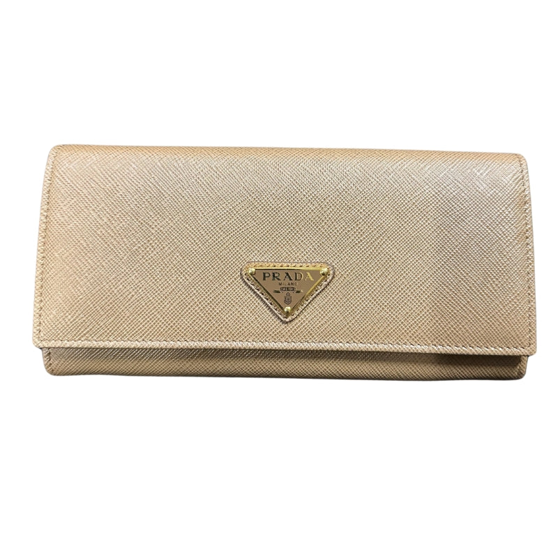 Prada Tan Saffiano Wallet
Card Slots
Large Saffiano Wallet
Snap Closure 