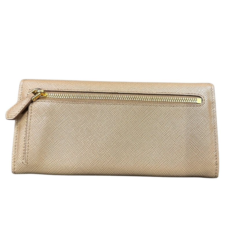 Prada Tan Saffiano Wallet
Card Slots
Large Saffiano Wallet
Snap Closure 