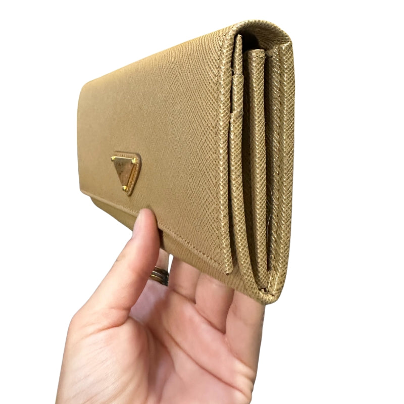 Prada Tan Saffiano Wallet
Card Slots
Large Saffiano Wallet
Snap Closure 