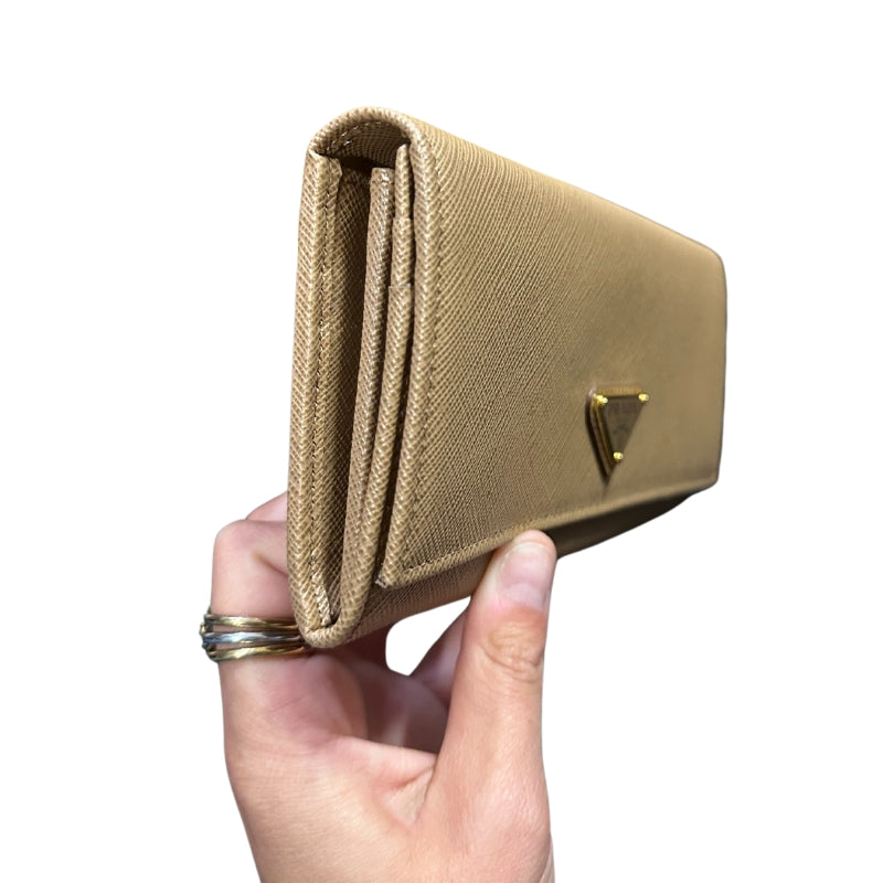 Prada Tan Saffiano Wallet
Card Slots
Large Saffiano Wallet
Snap Closure 