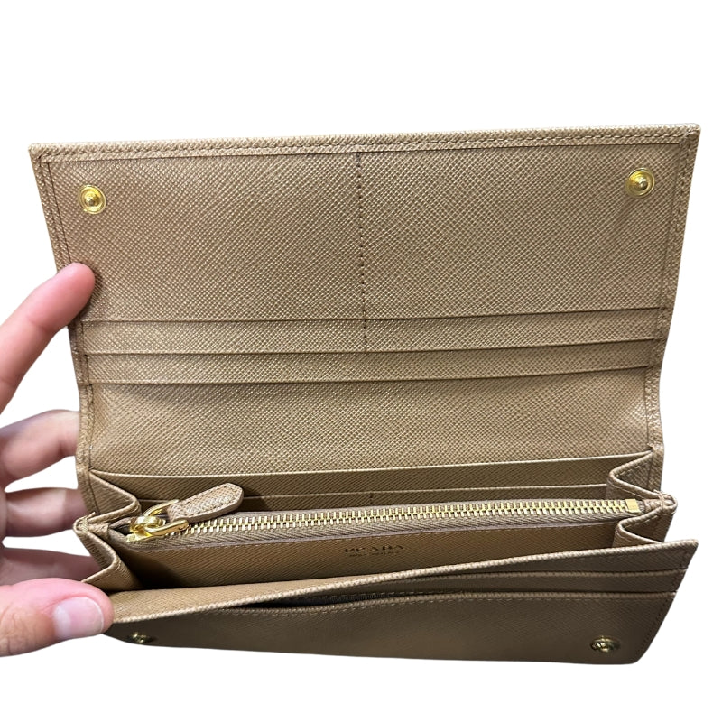 Prada Tan Saffiano Wallet
Card Slots
Large Saffiano Wallet
Snap Closure 