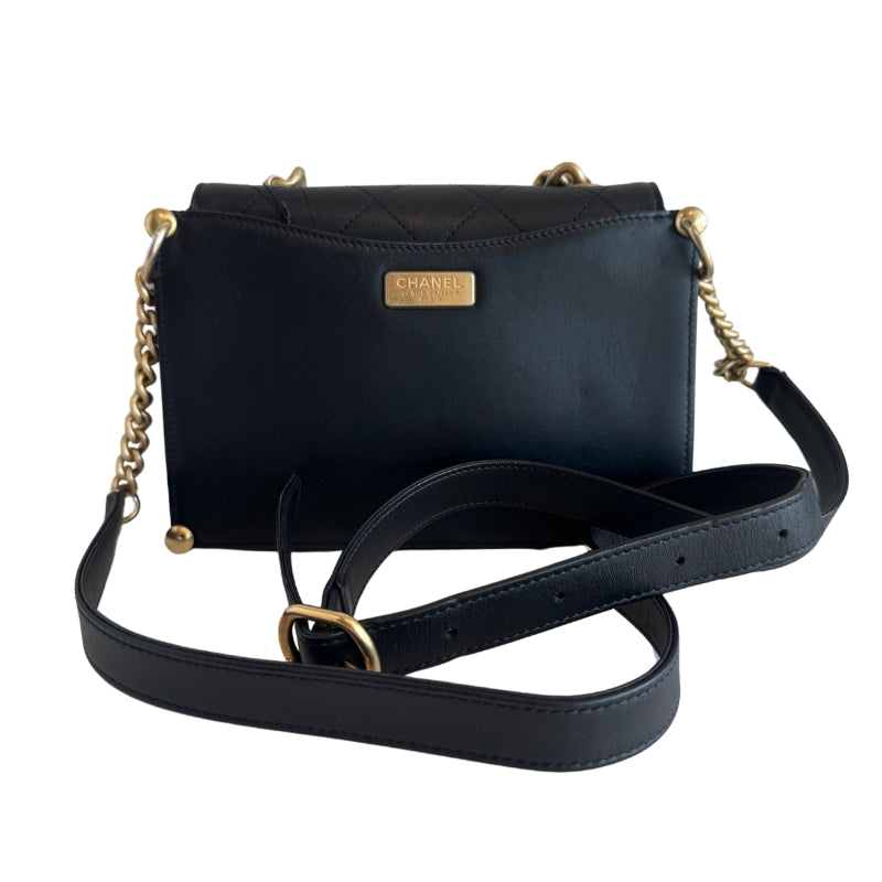 Chanel Stitched Flap Bag
Stitched Calfskin Leather 
Gold Hardware
Leather Strap 
Top Chain Link Handle
Front Flap
Chanel CC Turn 