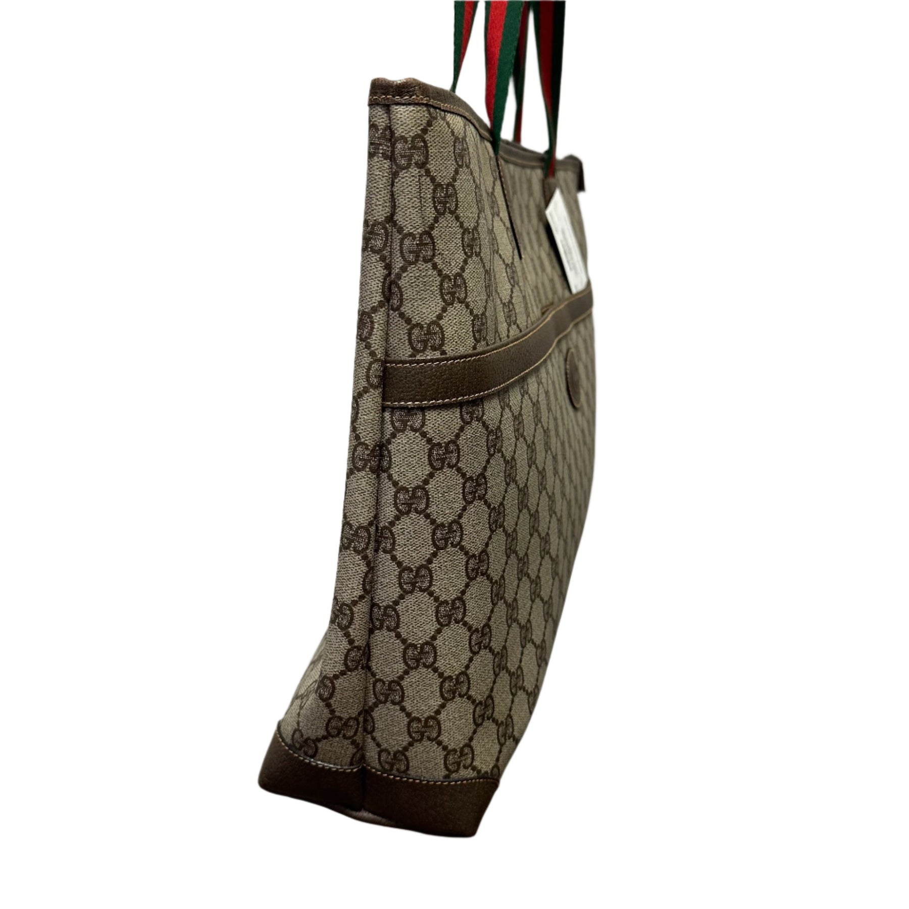 Gucci Boston Bag
Shoulder Tote
Brown Leather
GG Supreme
Leather Trim
Dual Shoulder Strap
Green & Red Strap
Canvas Lining
Zipper Closure at Top 