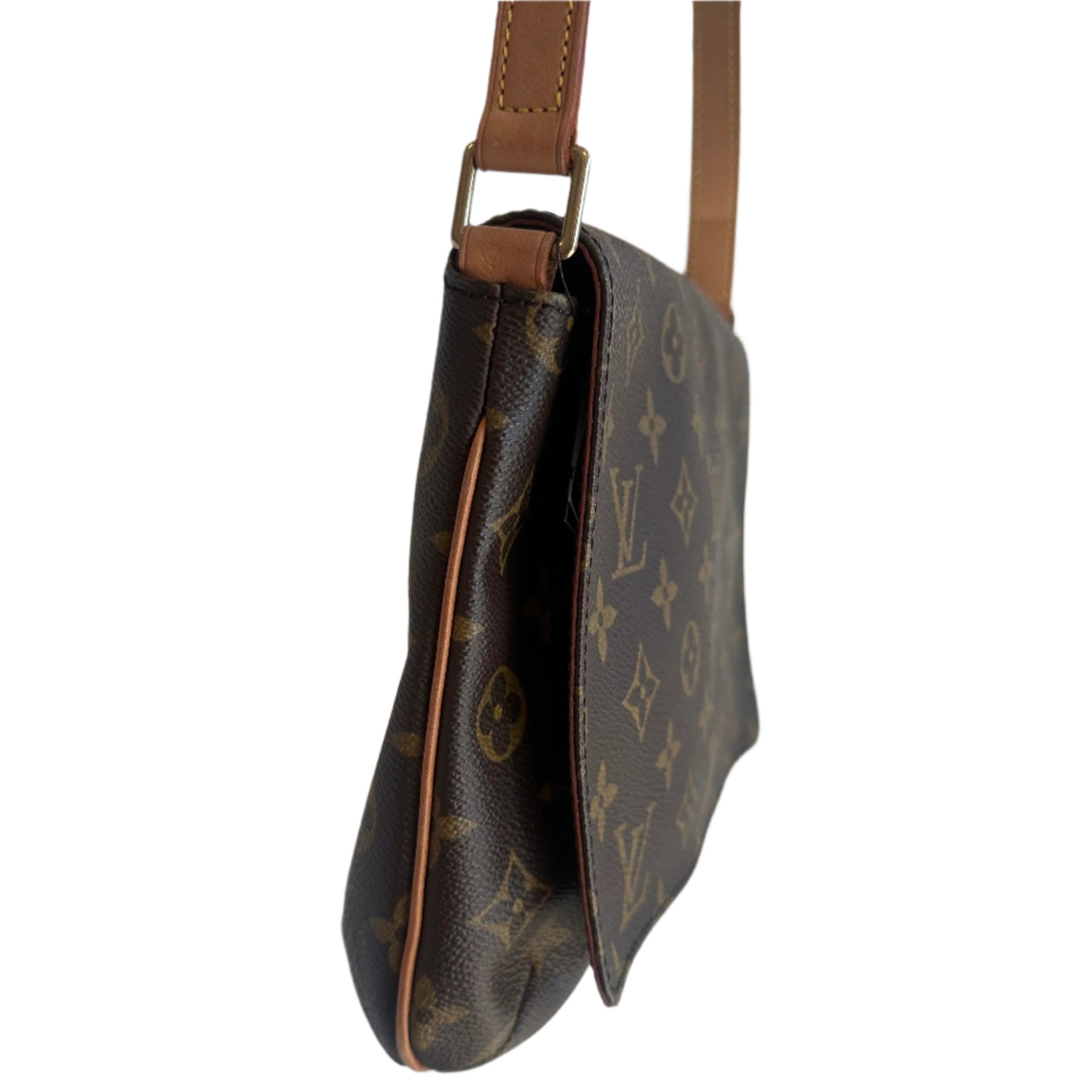 Louis Vuitton Tambourin 
Louis Vuitton Monogram 
Brown Coated Canvas
Vachetta Cowhide Leather Strap 
Frontal Flap 
