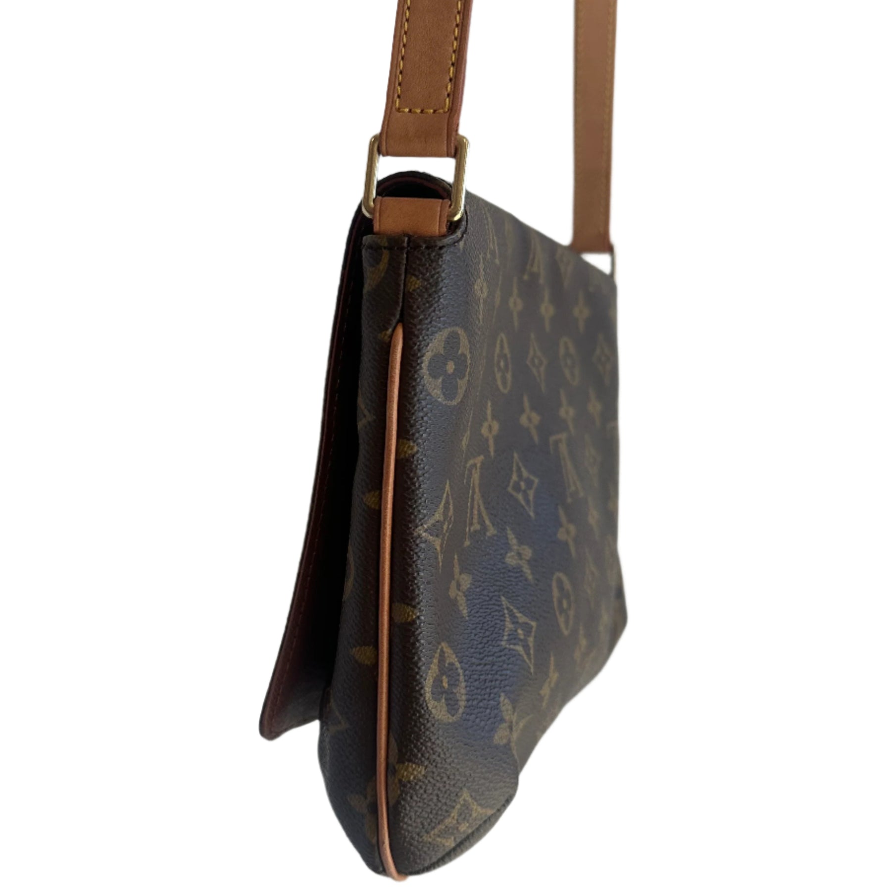 Louis Vuitton Tambourin 
Louis Vuitton Monogram 
Brown Coated Canvas
Vachetta Cowhide Leather Strap 
Frontal Flap 