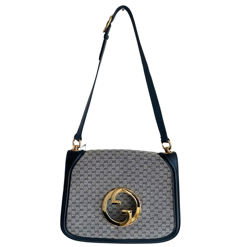 Gucci Blondie Shoulder Bag
Vintage Shoulder Bag
GG Monogram Canvas
Blue Leather Trim
Gold Gucci Interlock
GG Logo