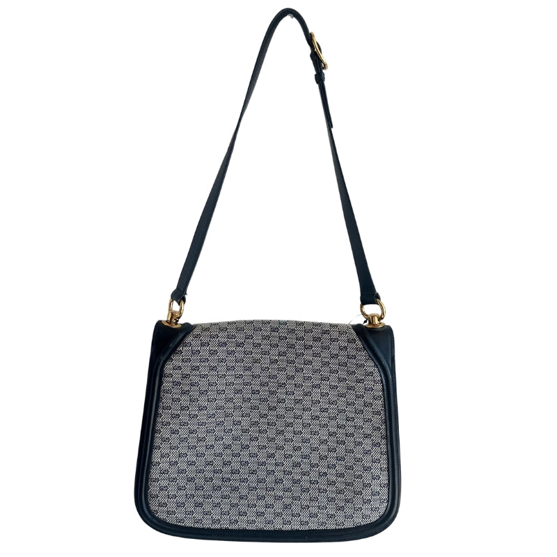 Gucci Blondie Shoulder Bag
Vintage Shoulder Bag
GG Monogram Canvas
Blue Leather Trim
Gold Gucci Interlock
GG Logo