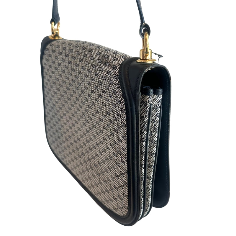 Gucci Blondie Shoulder Bag
Vintage Shoulder Bag
GG Monogram Canvas
Blue Leather Trim
Gold Gucci Interlock
GG Logo