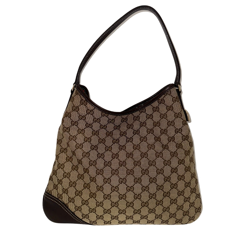 Gucci New Britt Hobo
Gucci Hobo
Neutral Canvas
Printed
Gold-Toned Hardware
Leather Trim
Single Shoulder Strap
Canvas Lining 