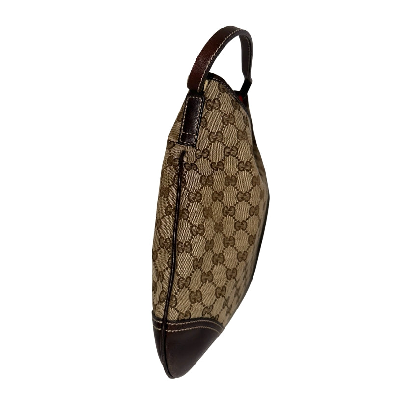 Gucci New Britt Hobo
Gucci Hobo
Neutral Canvas
Printed
Gold-Toned Hardware
Leather Trim
Single Shoulder Strap
Canvas Lining 