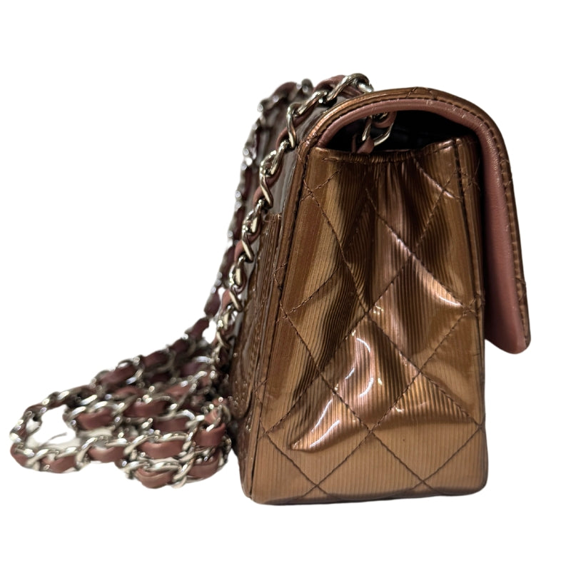 Chanel Patent Quilted Mini 
Diamond Quilted Patent Leather 
Bronze Color 
Vertical Stripes Pattern
Rear Pocket 
Long Silver Chain Link 
Front Flap
CC Lock Closure 
Matte Leather Interior 
