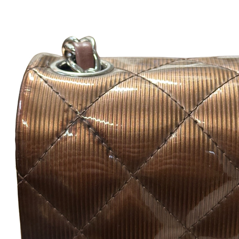Chanel Patent Quilted Mini 
Diamond Quilted Patent Leather 
Bronze Color 
Vertical Stripes Pattern
Rear Pocket 
Long Silver Chain Link 
Front Flap
CC Lock Closure 
Matte Leather Interior 