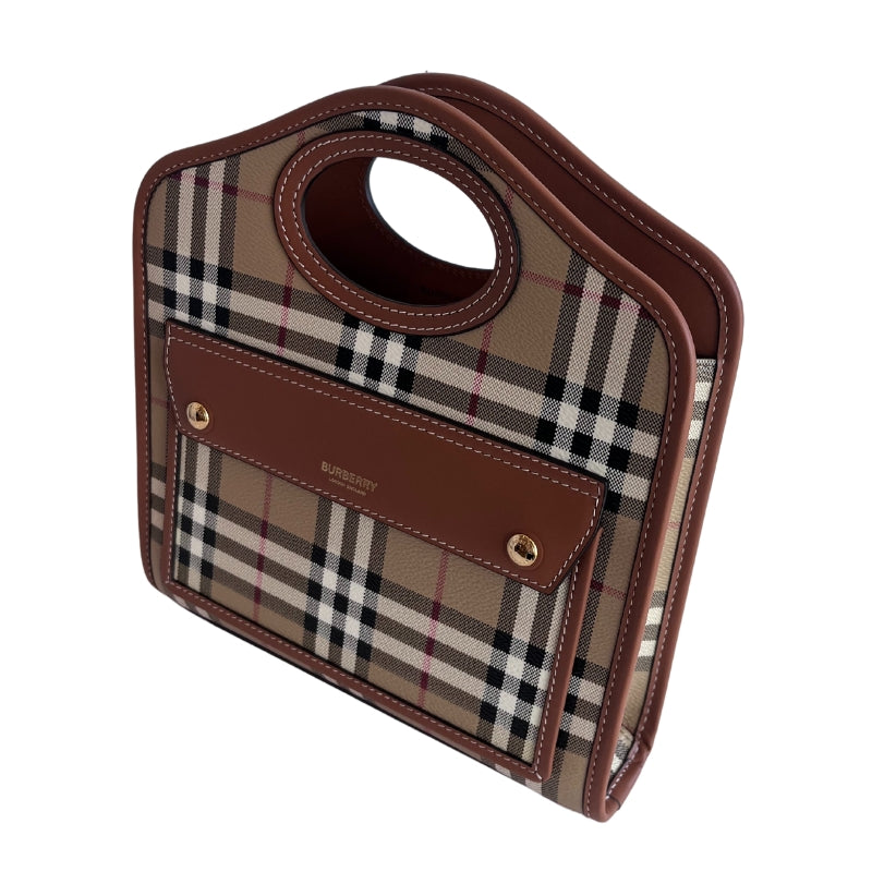 Burberry Mini Pocket Plaid Tote   Hard Case  Burberry Plaid   One Exterior Pocket  Detachable Shoulder Strap   One Interior Pocket 