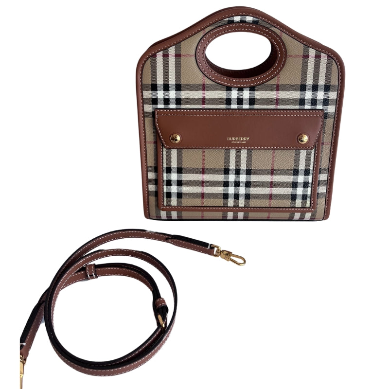 Burberry Mini Pocket Plaid Tote   Hard Case  Burberry Plaid   One Exterior Pocket  Detachable Shoulder Strap   One Interior Pocket 