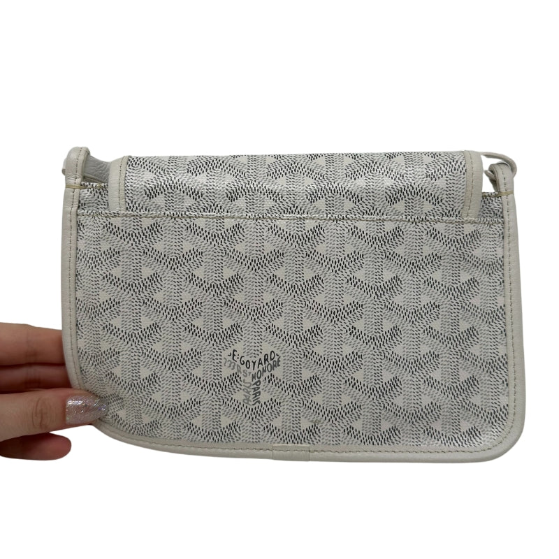 Goyard Plummet Clutch White Printed Goyardine Silver-Toned Hardware Single Shoulder Strap Single Exterior Pocket Canvas Lining Snap Closure at Front Zip Pocket in Interior Two Interior Card Pockets