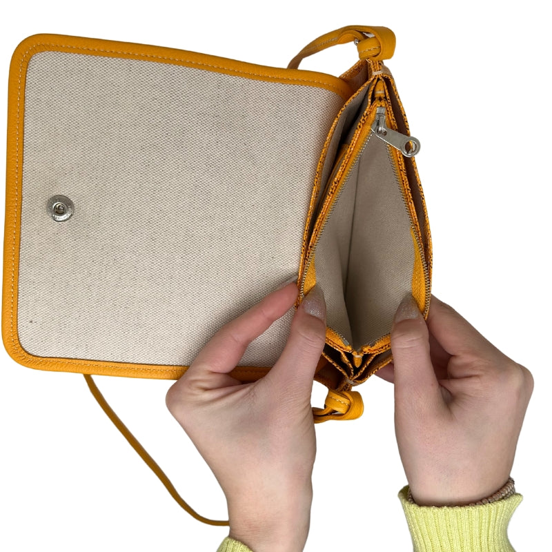 Goyard Plummet Clutch Yellow Printed   Goyardine   Silver-Toned Hardware  Single Shoulder Strap Single Exterior Pocket Canvas Lining Snap Closure at Front Zip Pocket in Interior Two Interior Card Pockets