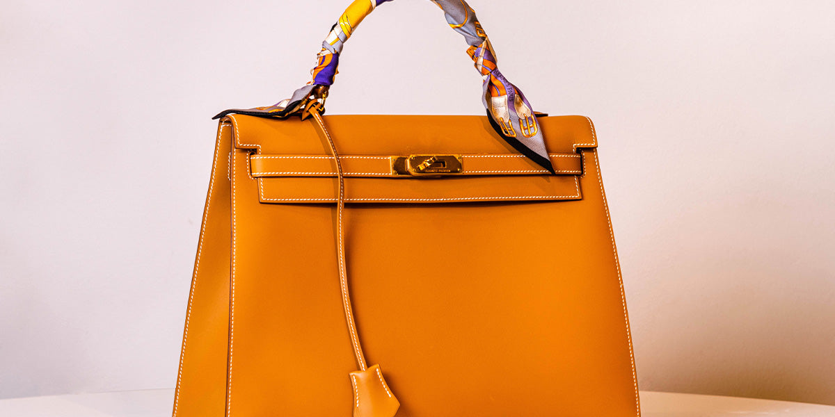 shop designer handbags in raleigh