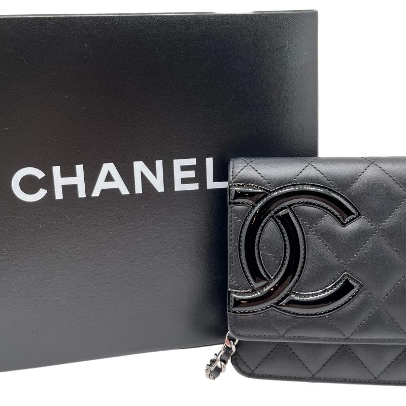 Chanel ligne cambon wallet on chain, quilted black leather exterior, patent CC logo detail, silver hardware, chain shoulder strap, snap closure at front, hot pink cc logo lining, dual interior pockets with card slots, condition excellent, front view