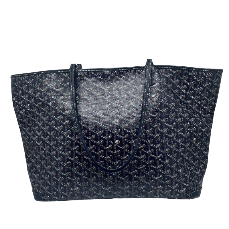 Goyard Navy Artois GM  Navy Printed Exterior  Silver Tone Hardware  Leather Trim  Dual Shoulder Straps  Canvas Lining  Single Interior Pocket  Zip Closure at Top  Condition: Good