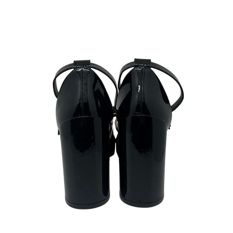 Christian Louboutin Patent Leather Mary Jane Heels, Size 41, Heel Height: 3.25", Black Patent Leather Exterior, Block Heel, Rounded Toe, Criss Cross Straps, Buck Details, Ankle Strap, condition excellent