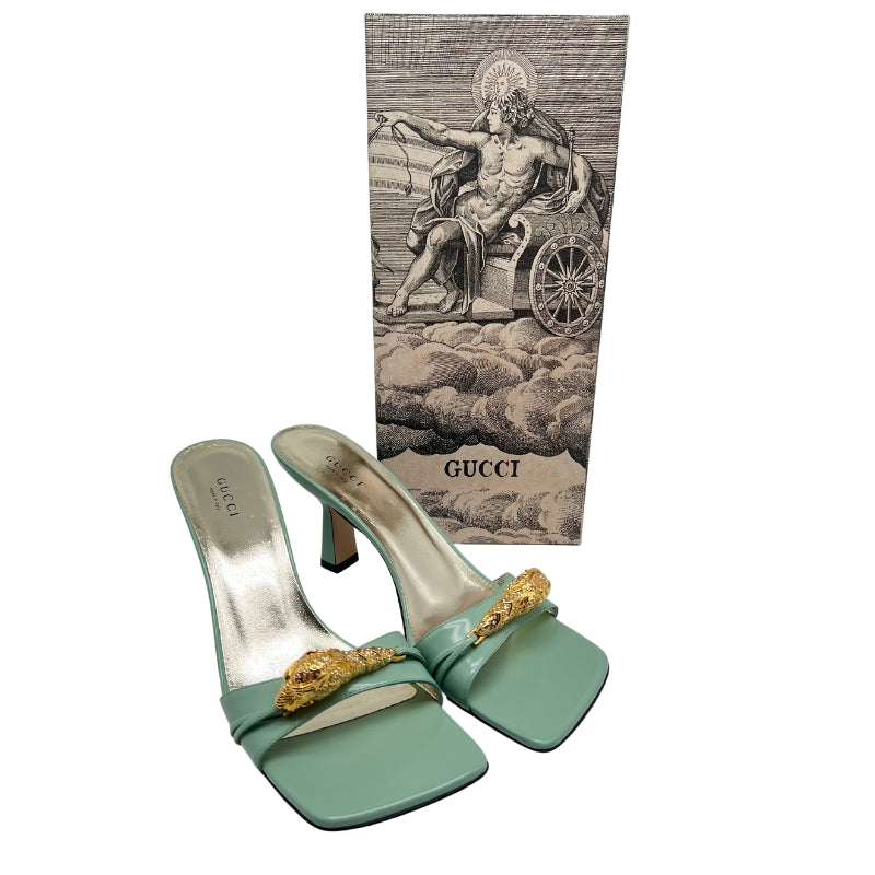 Gucci Nappa Dora Tiger Head Mid Heel| Size 9.5| Aqua Green| Strappy Heels| Lambskin Leather| Tiger Embellishments| Open Toe| Heel Height: 2"| Condition: Excellent.