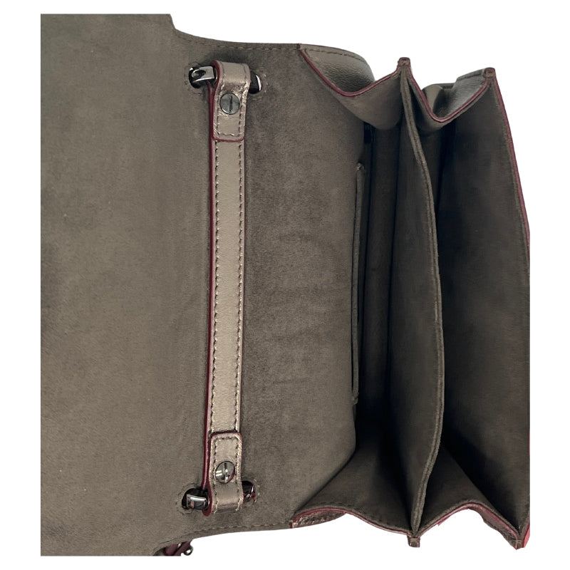 Interior View; Suede Lining, Maroon Trim.