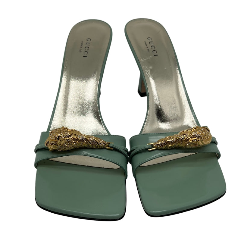 Gucci Nappa Dora Tiger Head Mid Heel| Size 9.5| Aqua Green| Strappy Heels| Lambskin Leather| Tiger Embellishments| Open Toe| Heel Height: 2"| Condition: Excellent.