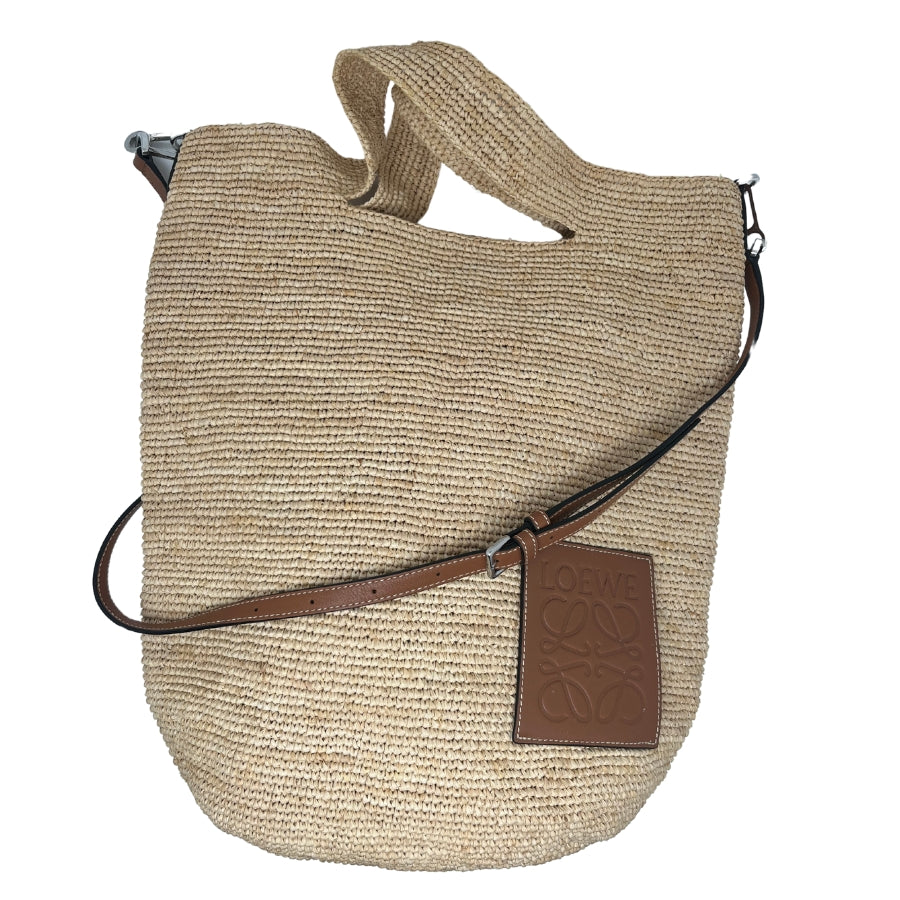 Loewe Large Raffia Slit Tote, Neutral Raffie Exterior, Leather Loewe Logo, Silver Tone Hardware, Cutout Handles, Detachable Adjustable Shoulder Strap, Open Top, Dust bag Included, Condition: Excellent