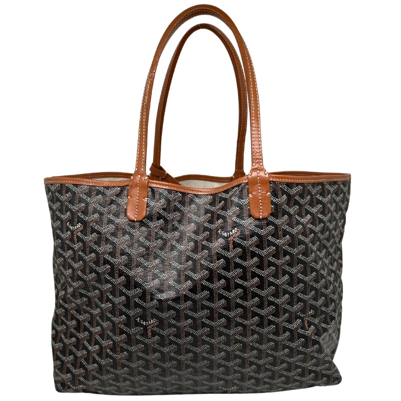 Front view: Coated Canvas. Tonal Leather Trim. Silver Hardware. Leather Shoulder Straps.