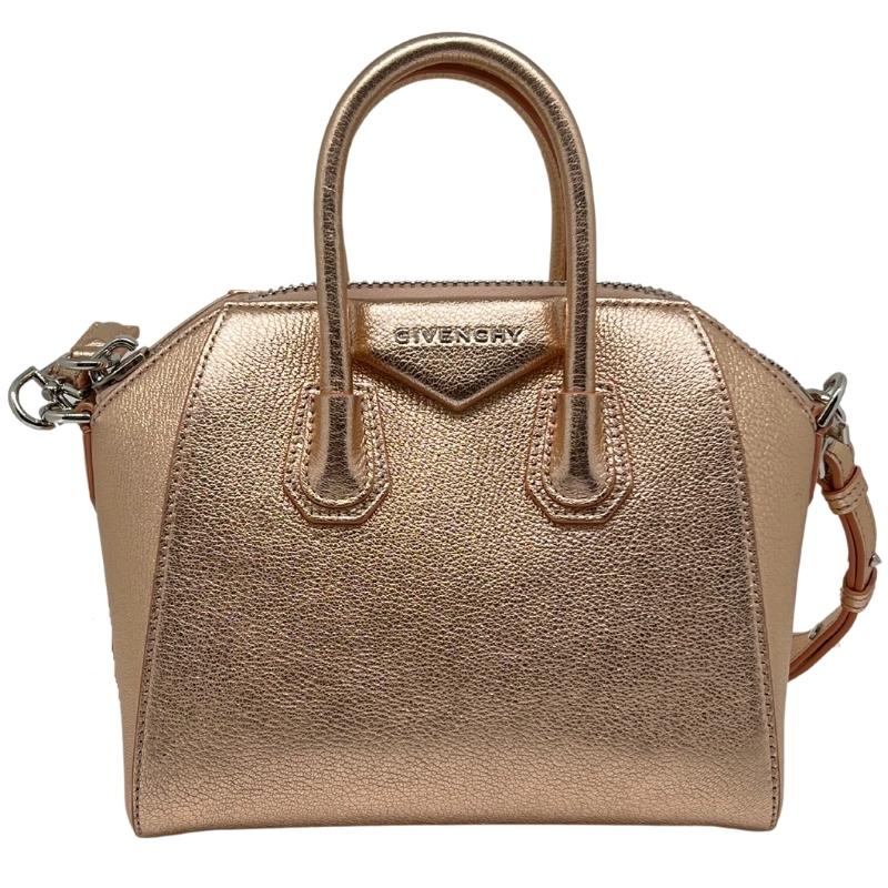Givenchy Metallic Sugar Goatskin Mini Antigona Rose Gold, Goatskin Leather, Metallic Rose Gold, Rolled Leather Top Handles, Leather Shoulder Strap, Silver Hardware, Top Zipper, Fabric Interior, Zipper Pocket, condition excellent