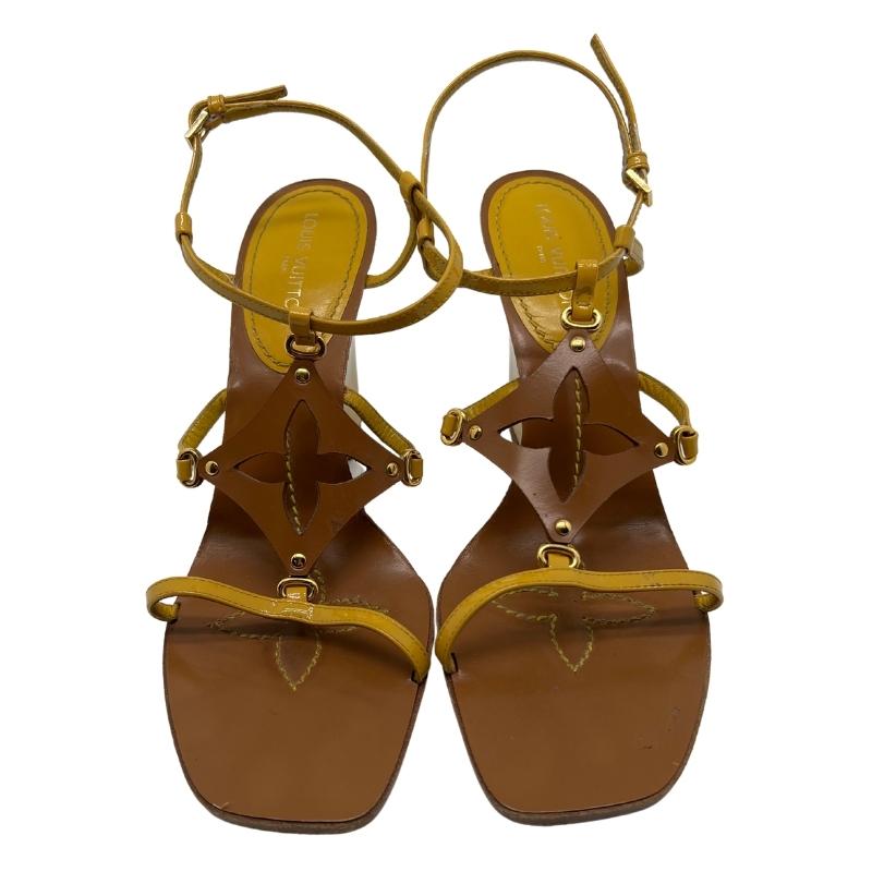 Louis Vuitton Wedge Sandals, Size: 38.5, Yellow Patent Leather, Tan Brown Leather, Fully Lined, Wedges Sandals, Flower Cut Outs, Buckle Closure, Leather Soles and Insoles, Heel Height: 10". Condition: Excellent.
