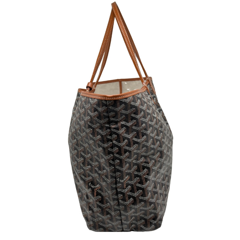 Side View: Tonal Leather Trim. Coated Canvas. Leather Shoulder Straps.