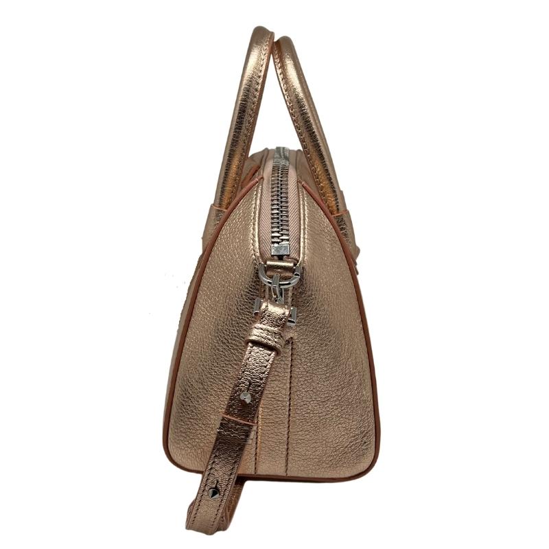 Givenchy Metallic Sugar Goatskin Mini Antigona Rose Gold, Goatskin Leather, Metallic Rose Gold, Rolled Leather Top Handles, Leather Shoulder Strap, Silver Hardware, Top Zipper, Fabric Interior, Zipper Pocket, condition excellent