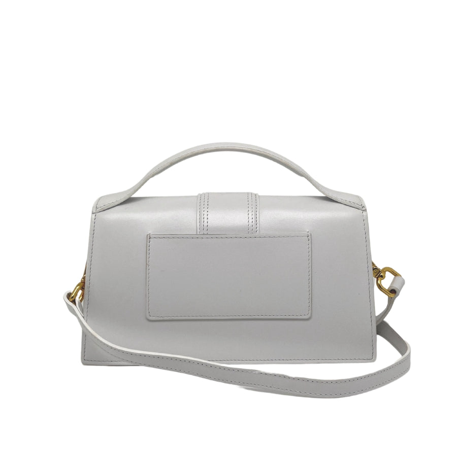 Jacquemus Le Grand Bambino Bag, White Leather Exterior, Gold-Tone Hardware, Rolled Top Handle, Detachable Adjustable Shoulder Strap, Snap Front Closure, Canvas Lining, Single Interior Pocket, Dust Bag Included, Condition: Excellent