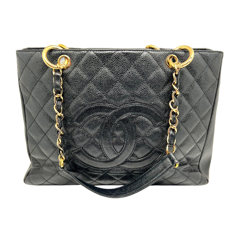 Front view: Quilted Caviar Leather in Black. Prominent Quilted Chanel CC Logo. Threaded Gold Chain-Link Shoulder Straps.