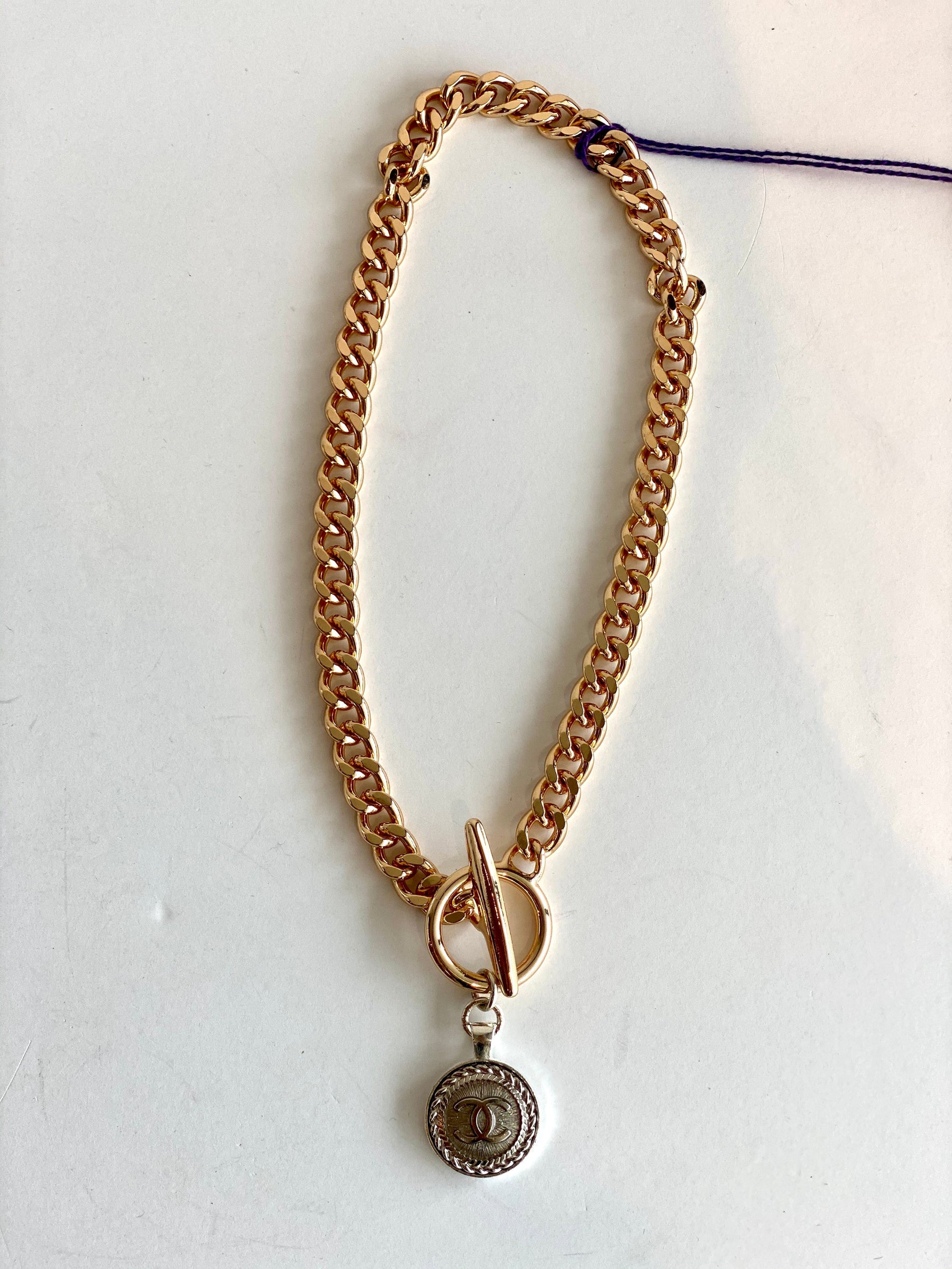 goldchainsilverbutton