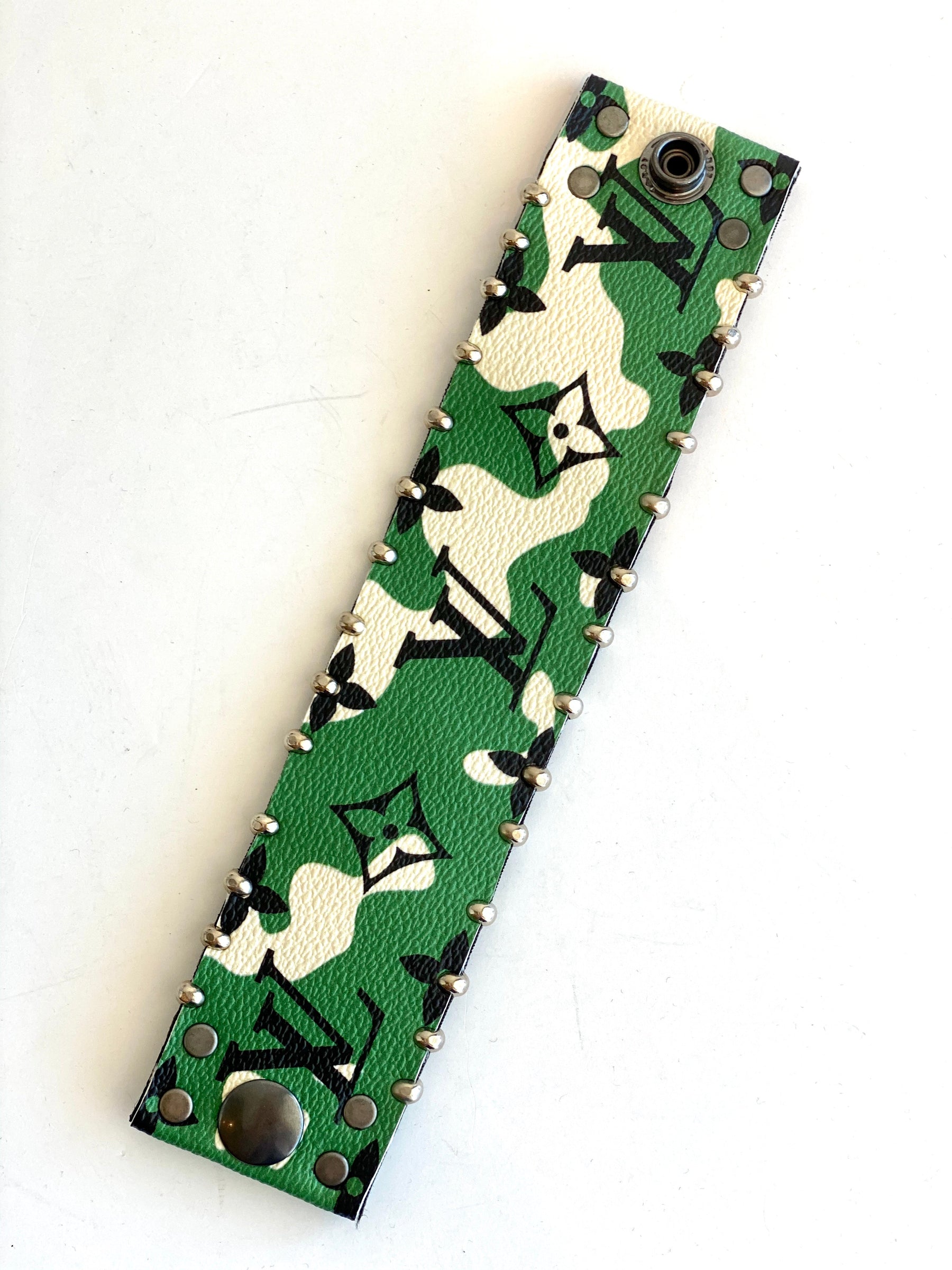 green and white and black leather bracelet