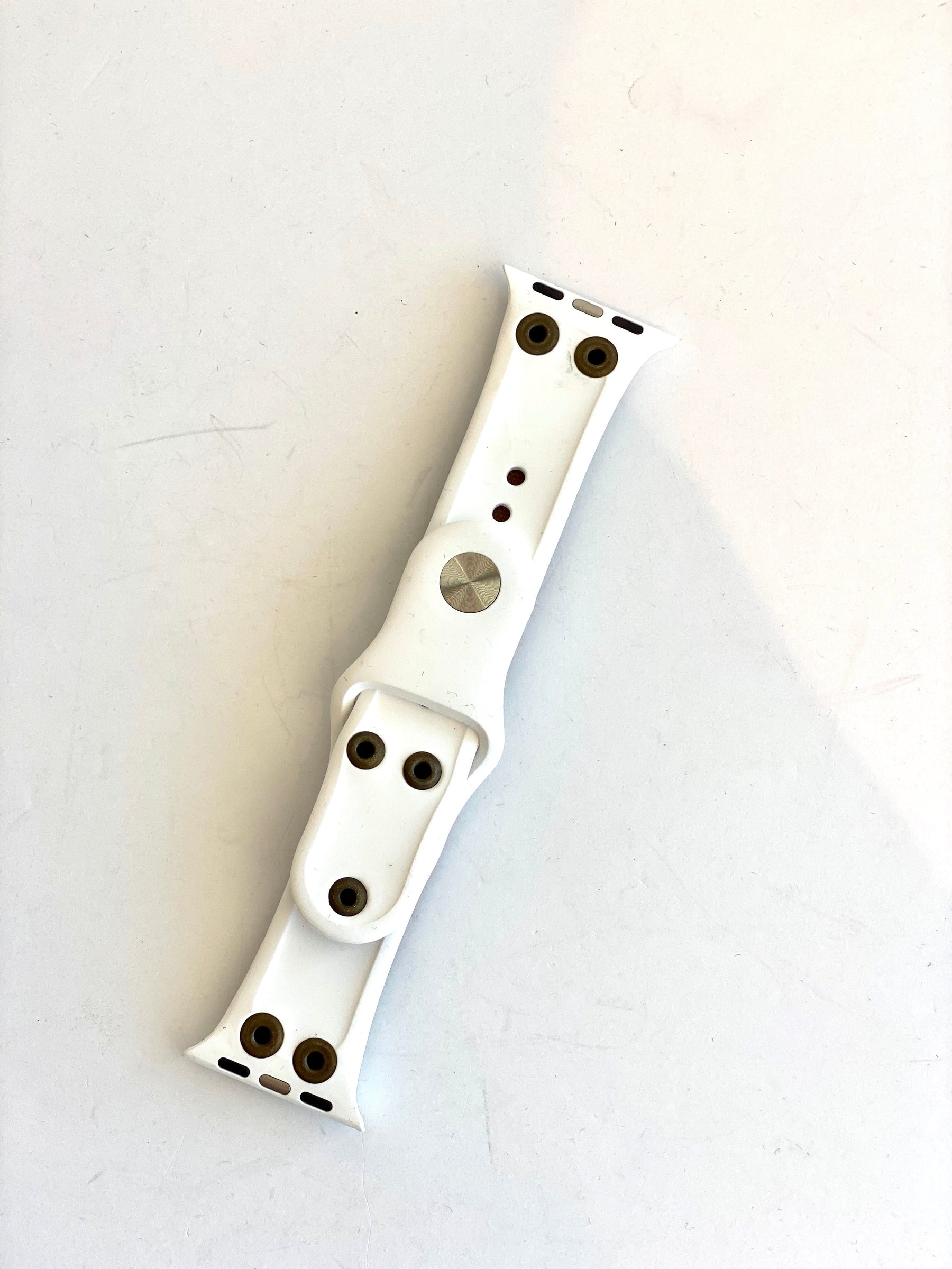 white and brown watch band