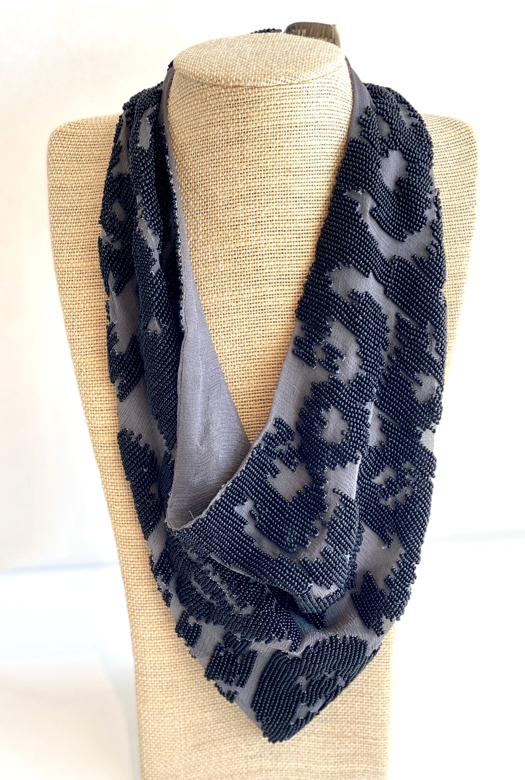 gray and black beaded necklace