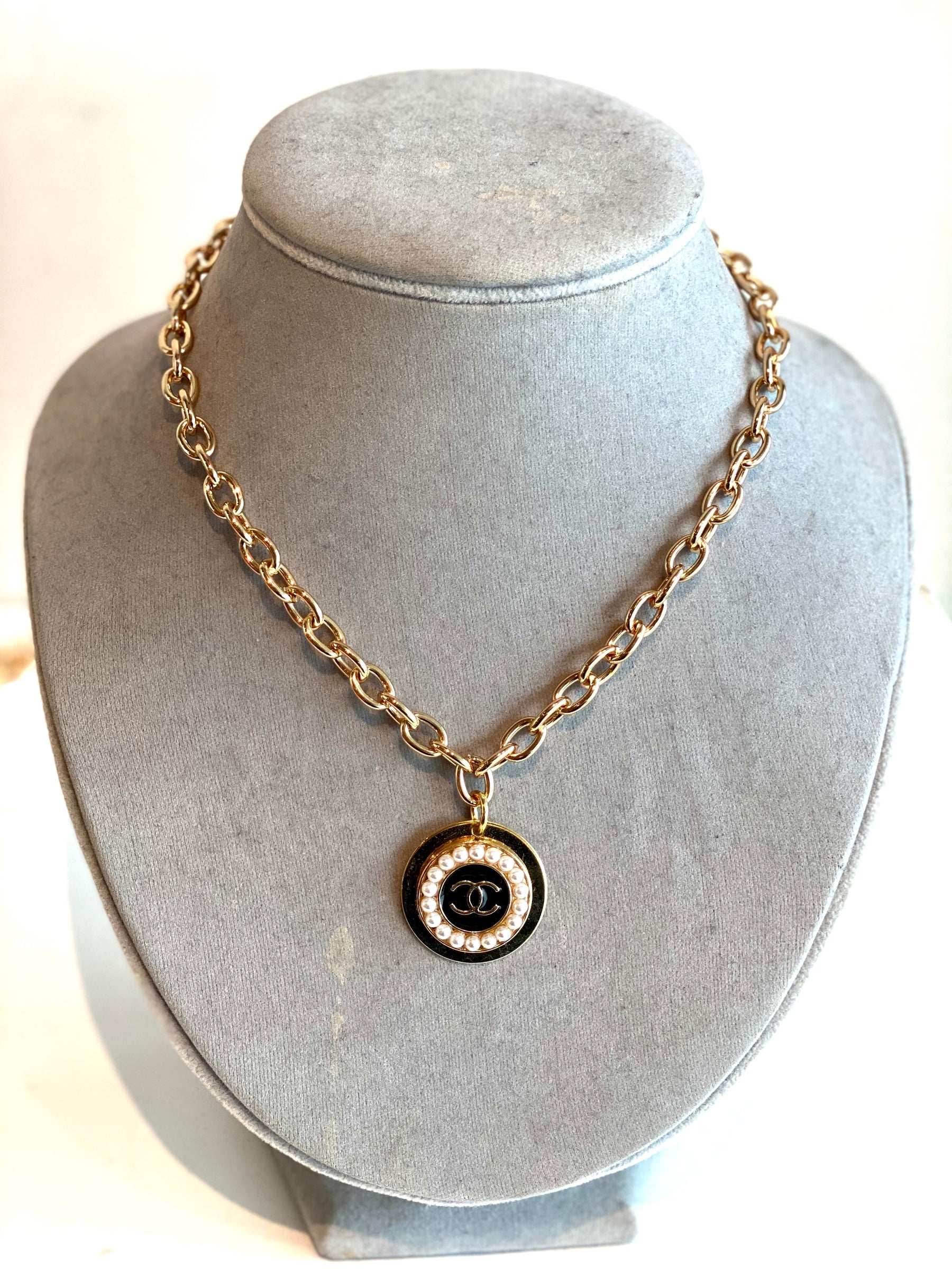 designer button pearl necklace