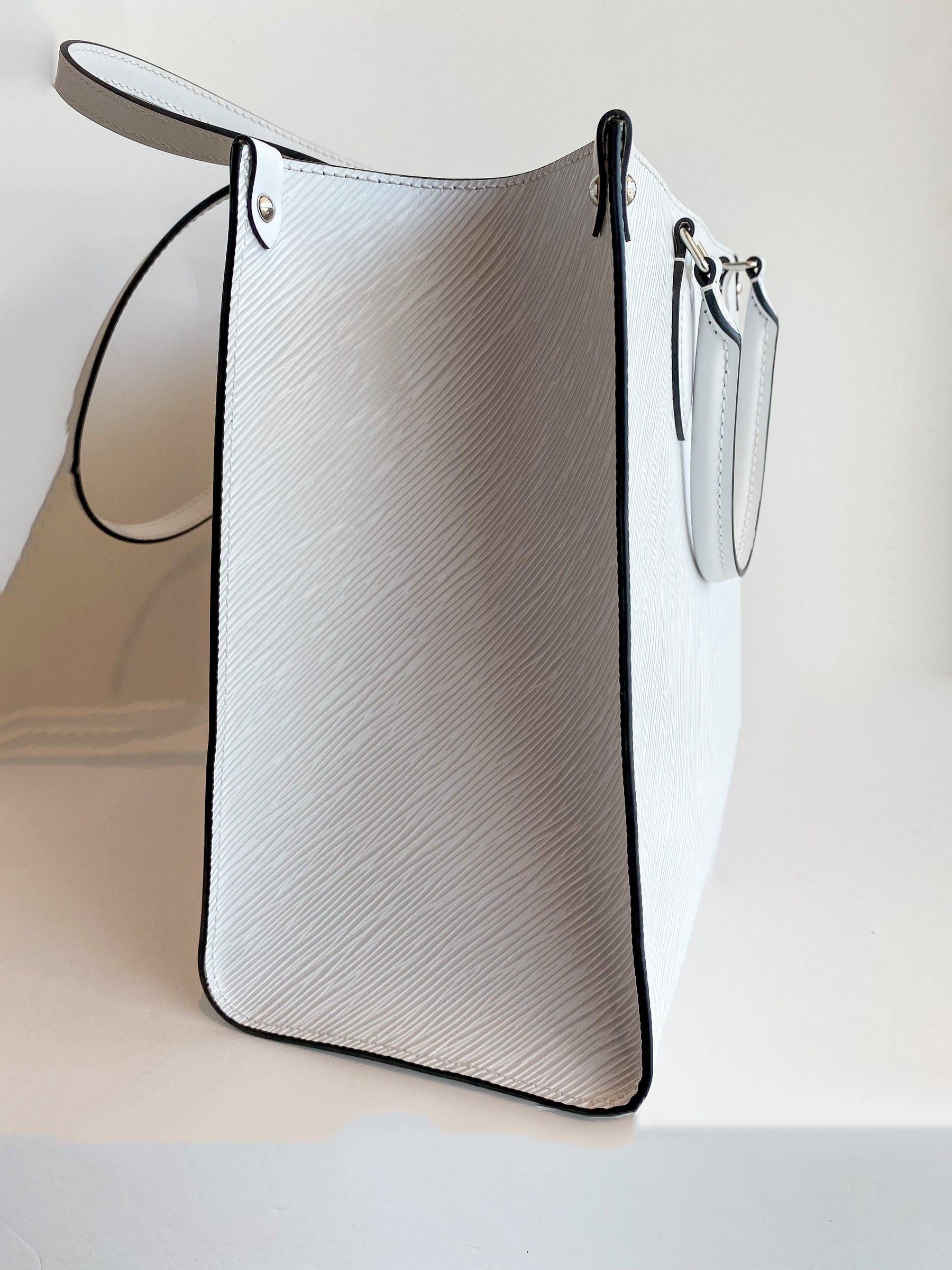 Louis Vuitton Onthego MM Epi Leather White Tote Bag Side of Bag