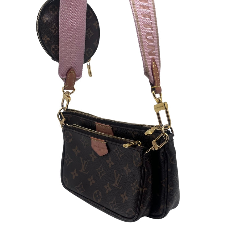 Louis Vuitton Multi Pochette Bag Monogram Canvas Exterior Brown Fabric Interior Detachable Front Pocket Zip Closure on Both Pockets Single Interior Flat Pocket Detachable Coin Purse with Cream Canvas Interior Gold Toned Hardware Pink Louis Vuitton Inscribed Cross Body Strap