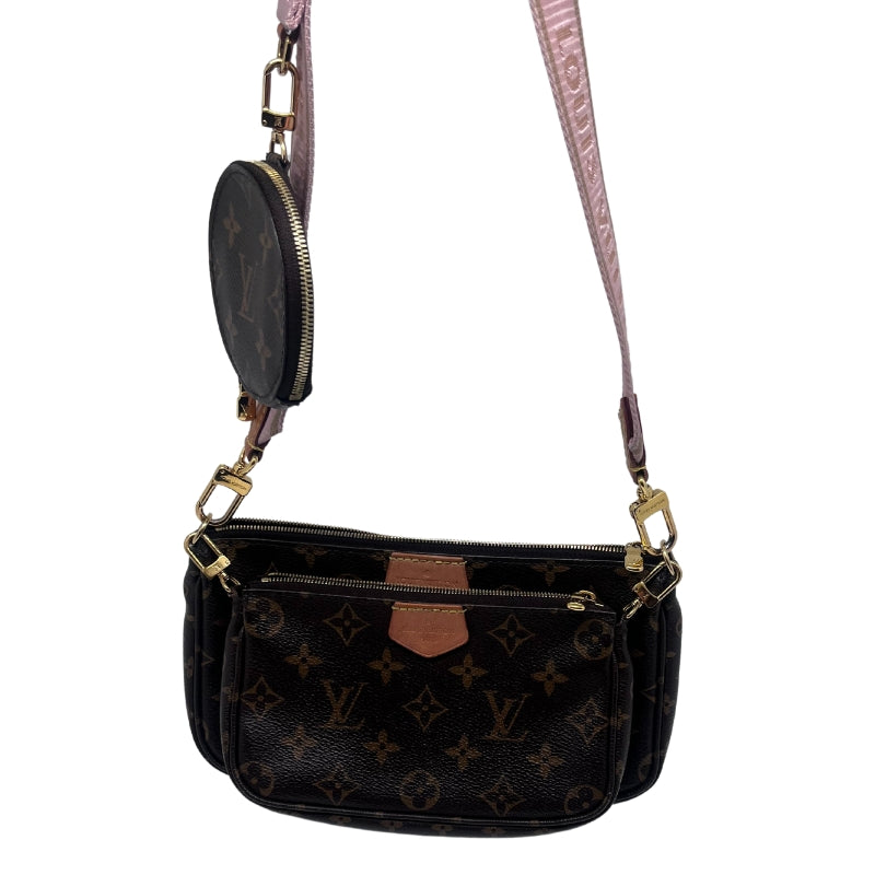 Louis Vuitton Multi Pochette Bag Monogram Canvas Exterior Brown Fabric Interior Detachable Front Pocket Zip Closure on Both Pockets Single Interior Flat Pocket Detachable Coin Purse with Cream Canvas Interior Gold Toned Hardware Pink Louis Vuitton Inscribed Cross Body Strap