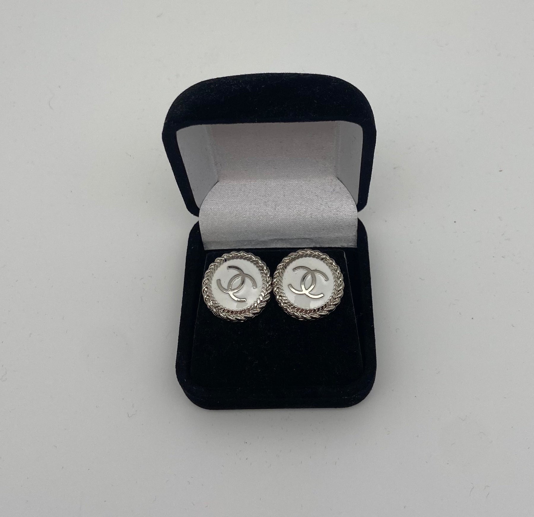 Silver and white Chanel button earrings interlocking CC