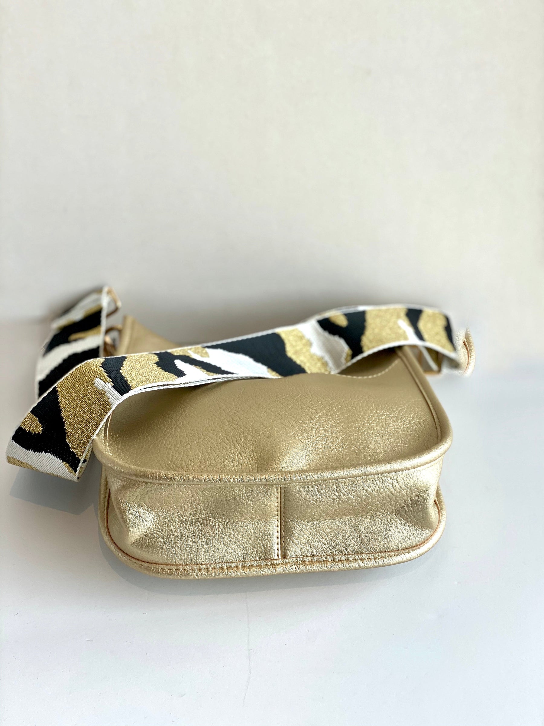 gold mini messenger bottom