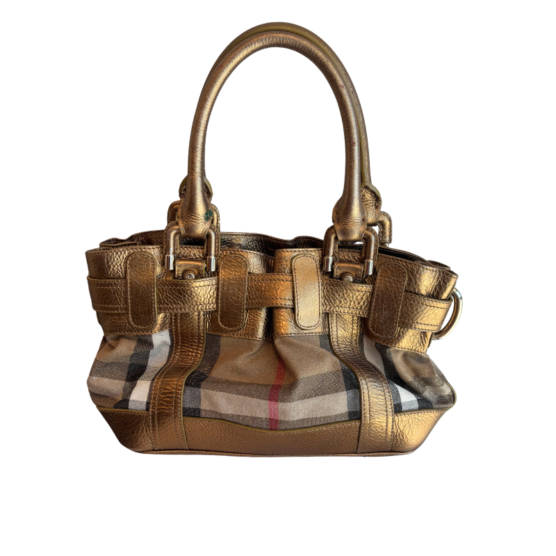 A metallic gold leather handbag with double top handles and a classic plaid pattern panel on the front, set against a plain white background.